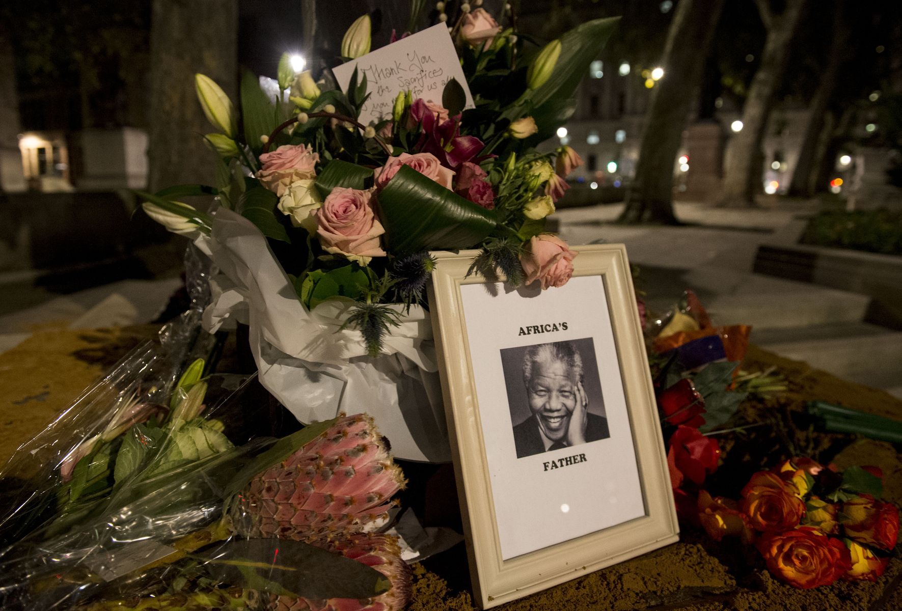 <p>Nelson Mandela died on December 5, 2013, in Johannesburg <a href="https://www.history.com/this-day-in-history/nelson-mandela-death-2013" rel="noreferrer noopener">following a lung infection</a>. As South Africans gathered throughout the country to honour the anti-apartheid hero, a <a href="https://www.bbc.com/news/in-pictures-25388162" rel="noreferrer noopener">state funeral was held in Qunu, near his childhood village</a>, attended by dignitaries from around the world. An <a href="https://www.ctvnews.ca/world/xhosa-rituals-to-be-featured-in-mandela-s-funeral-1.1592259" rel="noreferrer noopener">intimate traditional Xhosa ceremony then took place</a> in Mandela’s family cemetery.</p>
