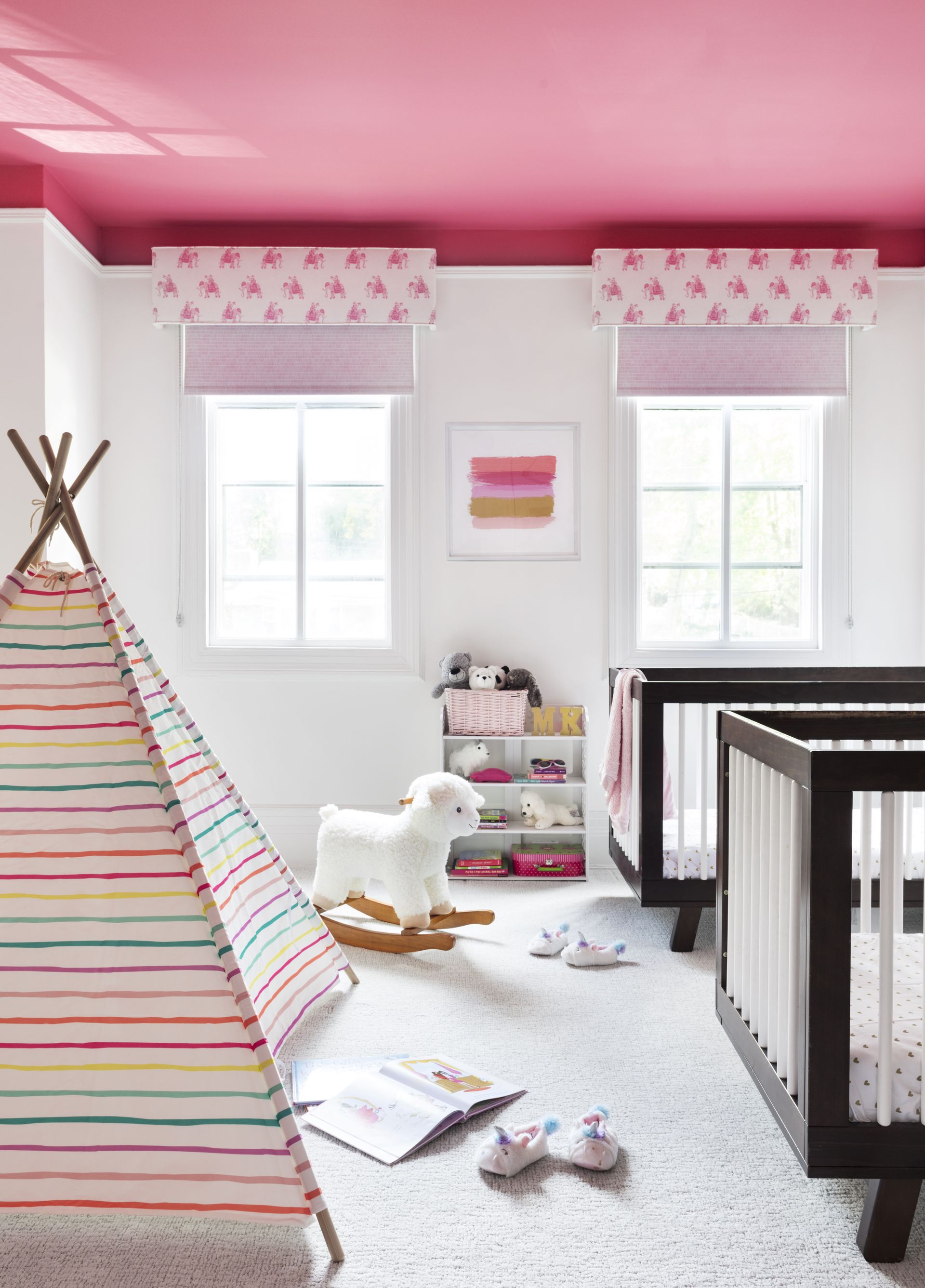 <p>                     Could the ceiling in your nursery be ripe for decorative rediscovery? Many designers seem to think so. The ceiling holds endless possibilities for creativity, and should be treated with the same consideration as any other wall in your home.                   </p>                                      <p>                     'I love the thoughtful use of color in this room, particularly the bright pink ceiling which is a reminder to always look up,' says Malka Helft, founder of Think Chic Interiors. 'Having a through line in a room is key, especially in a kid's room who may have some opinions on decor as they grow up. In this room, it's the use of pink that ties it all together – the window treatments, the striped play tent, and the brushstrokes on the art.'                   </p>