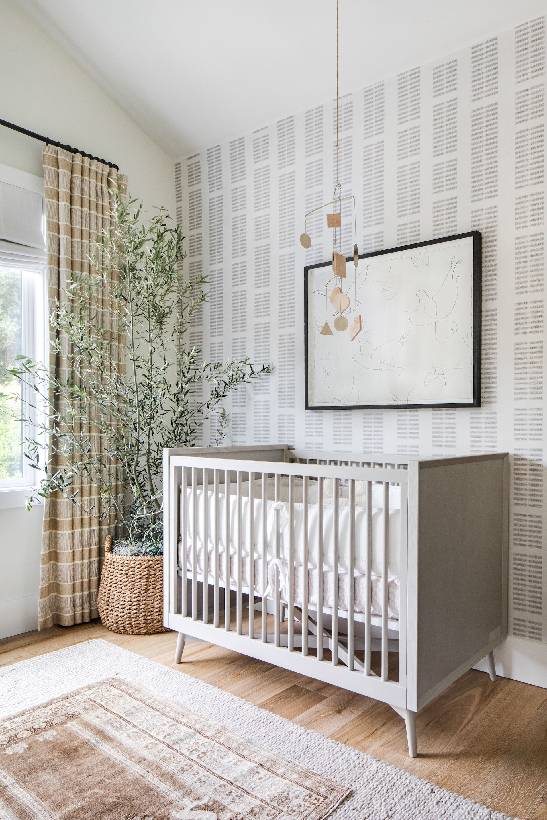 <p>                     Fun colors aren't for all of us, and if you love the pared-back neutral style then adopting that in your baby girl's nursery will carry on the flow throughout your home. Keep it interesting by choosing a subtle yet graphic wallpaper, a grey cot, earthy toned drapes and a vintage rug.                   </p>