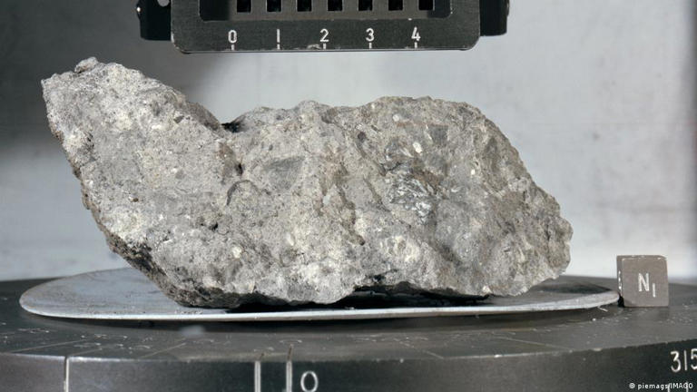 A new analysis of crystals taken from this lunar rock suggests the moon is 40 million years older than previously thought