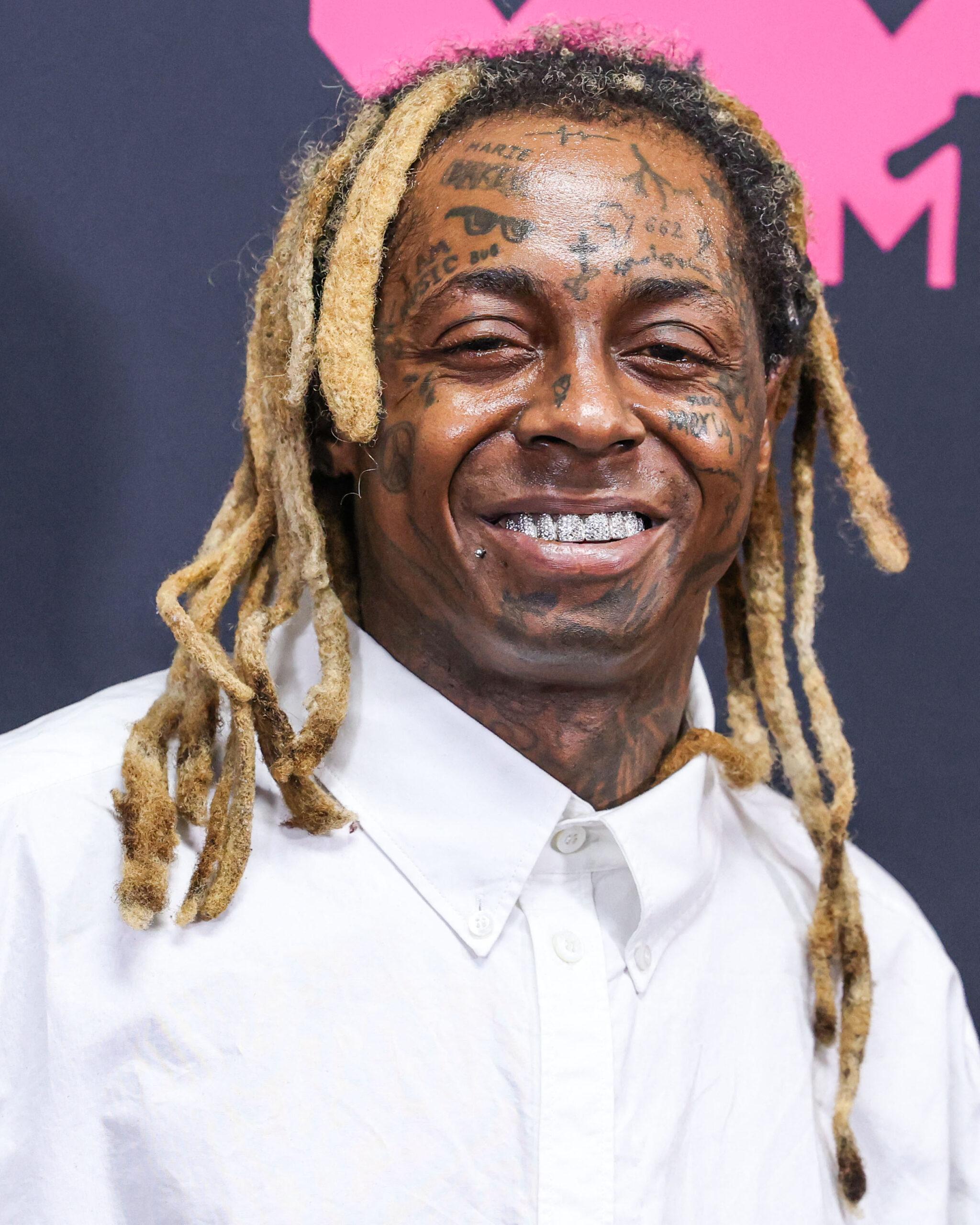 Lil Wayne Reacts To Viral Video Of His Wax Figure: ‘Dat S— Ain’t Me!’