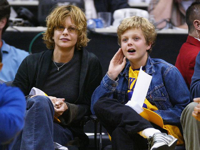 Vince Bucci/Getty Meg Ryan and son Jack Quaid attend an NBA game in April 2004.