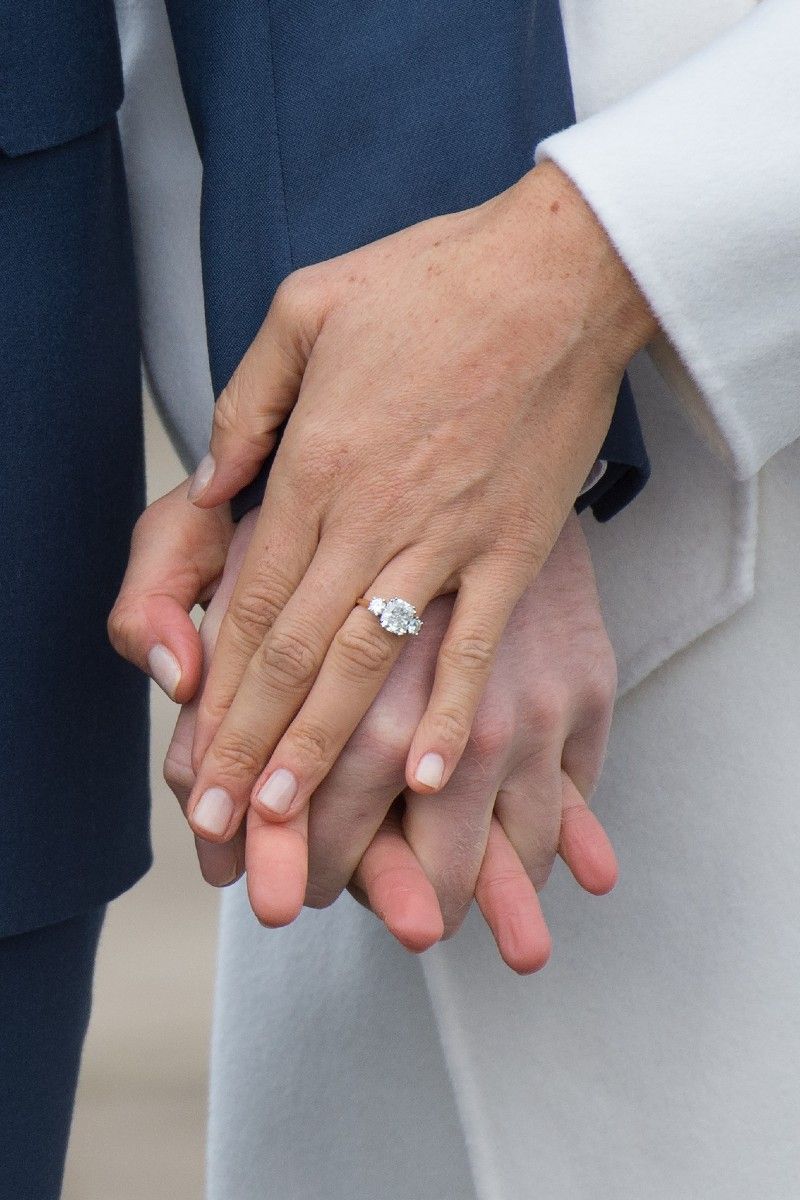 <p>                     Meghan's engagement ring was made of three stones, a style known as a trilogy ring. The cushion-cut centre diamond of her engagement ring was estimated to be roughly three carats and was sourced from Botswana, a place with emotional significance to both she and Harry.                   </p>                                      <p>                     The smaller side diamonds came from the personal collection of Princess Diana.                   </p>