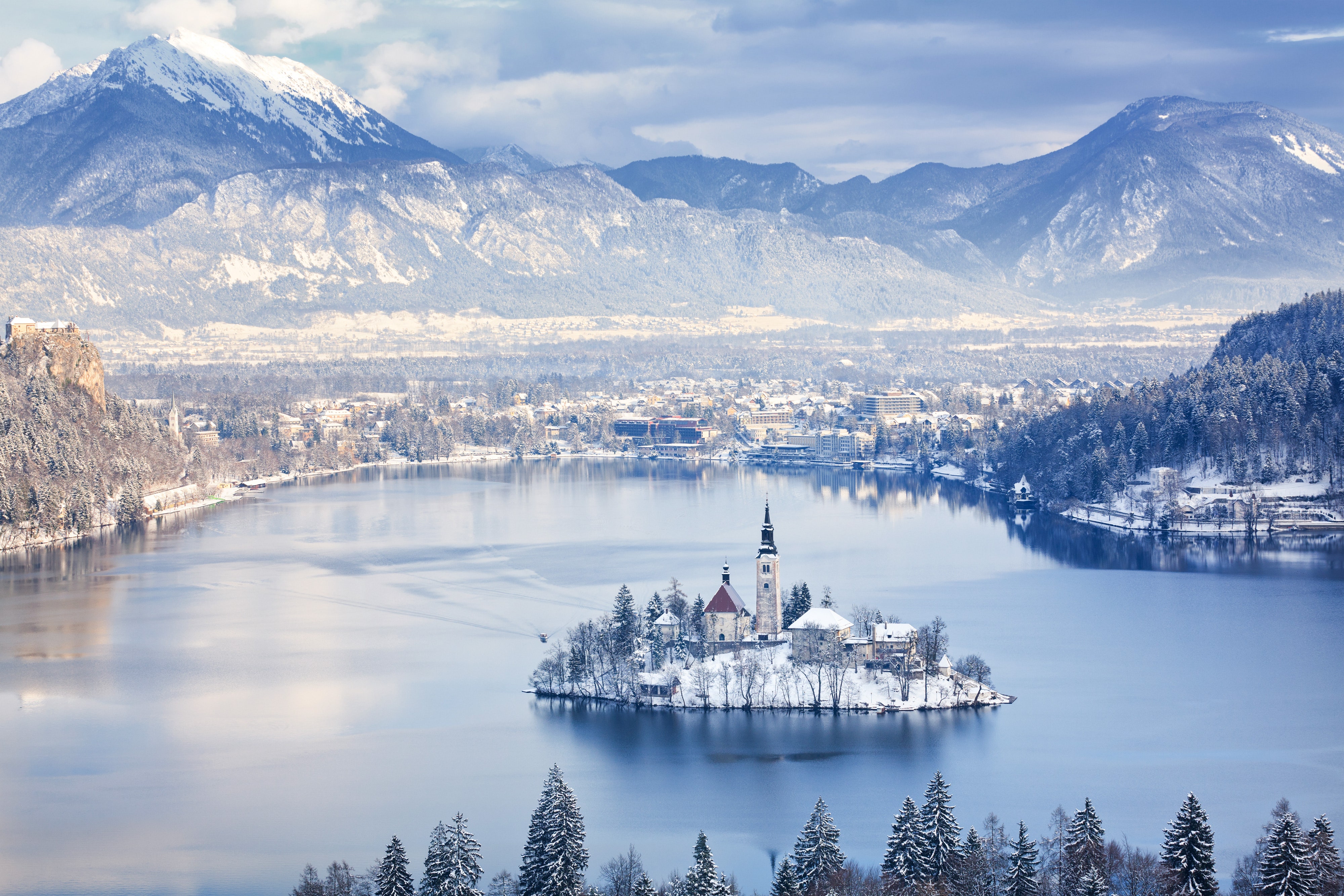 With its church-dotted islet and waters begging for rowboat rides, it’s no wonder <a href="https://www.cntraveler.com/gallery/best-places-to-visit-in-slovenia?mbid=synd_msn_rss&utm_source=msn&utm_medium=syndication">Lake Bled</a> is one of the most popular destinations in Slovenia. The site gets even more postcard-worthy when the surrounding Julian Alps become covered with snow and a fog settles over the lake.<p>Sign up to receive the latest news, expert tips, and inspiration on all things travel</p><a href="https://www.cntraveler.com/newsletter/the-daily?sourceCode=msnsend">Inspire Me</a>