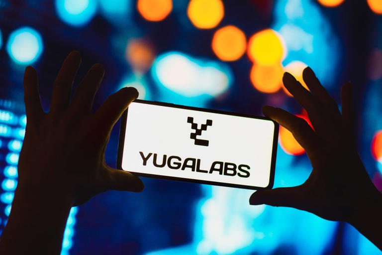 The Yuga Labs logo seen displayed on a smartphone.