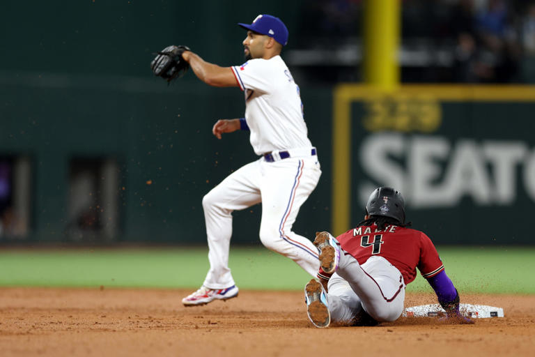 Diamondbacks second baseman Ketel Marte steals second in the third inning of Game 1 of the World Series.