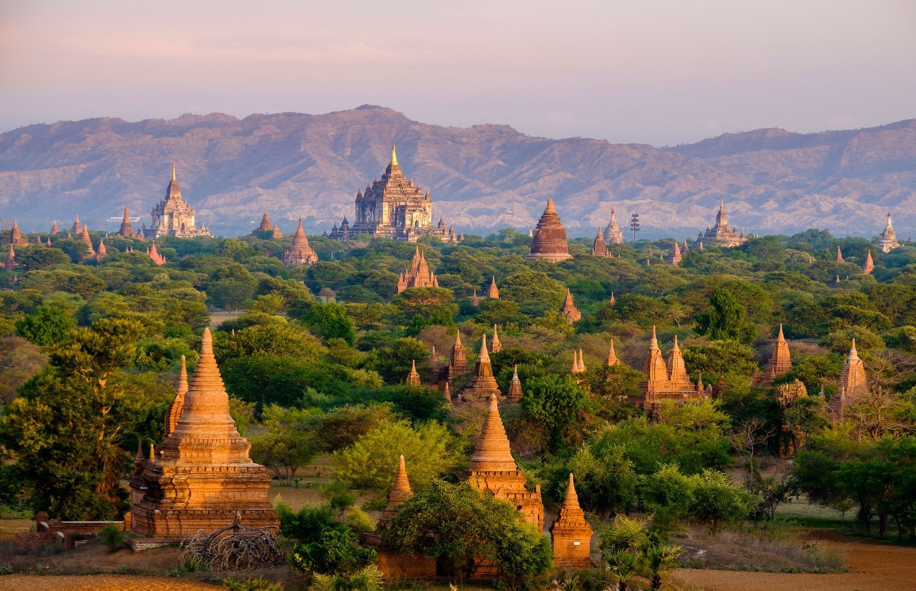 The enigmatic city of <a href="https://www.theatlantic.com/photo/2019/07/bagan-myanmar-photos/594985/" rel="noreferrer noopener">Bagan</a> is an extraordinary archaeological site featuring thousands of temples scattered over a vast territory in the heart of Myanmar. Visit historical monuments like the Ananda and Dhammayangyi Temples and don’t forget to book a cruise on the Ayeyarwady River to admire the landscape from a different perspective. For a truly magical experience, climb aboard a hot-air balloon at sunrise or sunset for an incredible view of Bagan—you won’t regret it!
