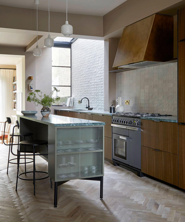 5 things to consider when adding a kitchen island, according to ...