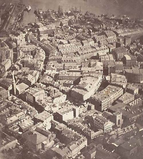 <p><span>This stunning aerial photograph of Boston in 1860 captures a city on the cusp of significant change. The bustling port, with its ships and warehouses, is nestled up against the winding Charles River, while the cobblestone streets of Beacon Hill are seen further inland. This snapshot of history gives us a glimpse into what life was like for the people who lived here during this period. From abolitionists to merchants, immigrants to revolutionaries, this vibrant city was home to many different types of people. Incredibly, this view would be unrecognizable within just a few decades as the city underwent rapid expansion and modernization.</span></p>