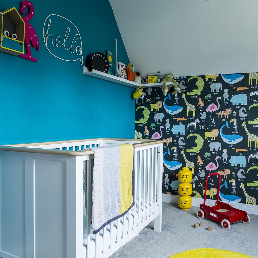 <p>                     Decorate a little one's room with a riot of colour to enliven their senses and make the small room feel uplifted and vibrant. Add a feature wall of accent colour, one which is echoed throughout your chosen wallpaper design. Here the punchy turquoise wall reflects the bold colours in the playful zoo print wallpaper on the opposite wall.                   </p>                                      <p>                     Choosing a wallpaper with characters is both educational and fun, surrounding them with familiar faces.                   </p>