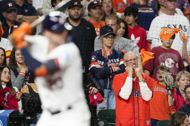 A Houston Astros fan grimaces as Chas McCormick bats with two outs in the ninth inning of Game 1 during the American League Championship Series at Minute Maid Park on Sunday, Oct. 15, 2023, in Houston.