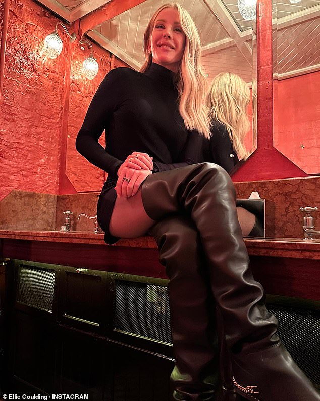 Ellie Goulding puts on a leggy display in thigh-high leather boots