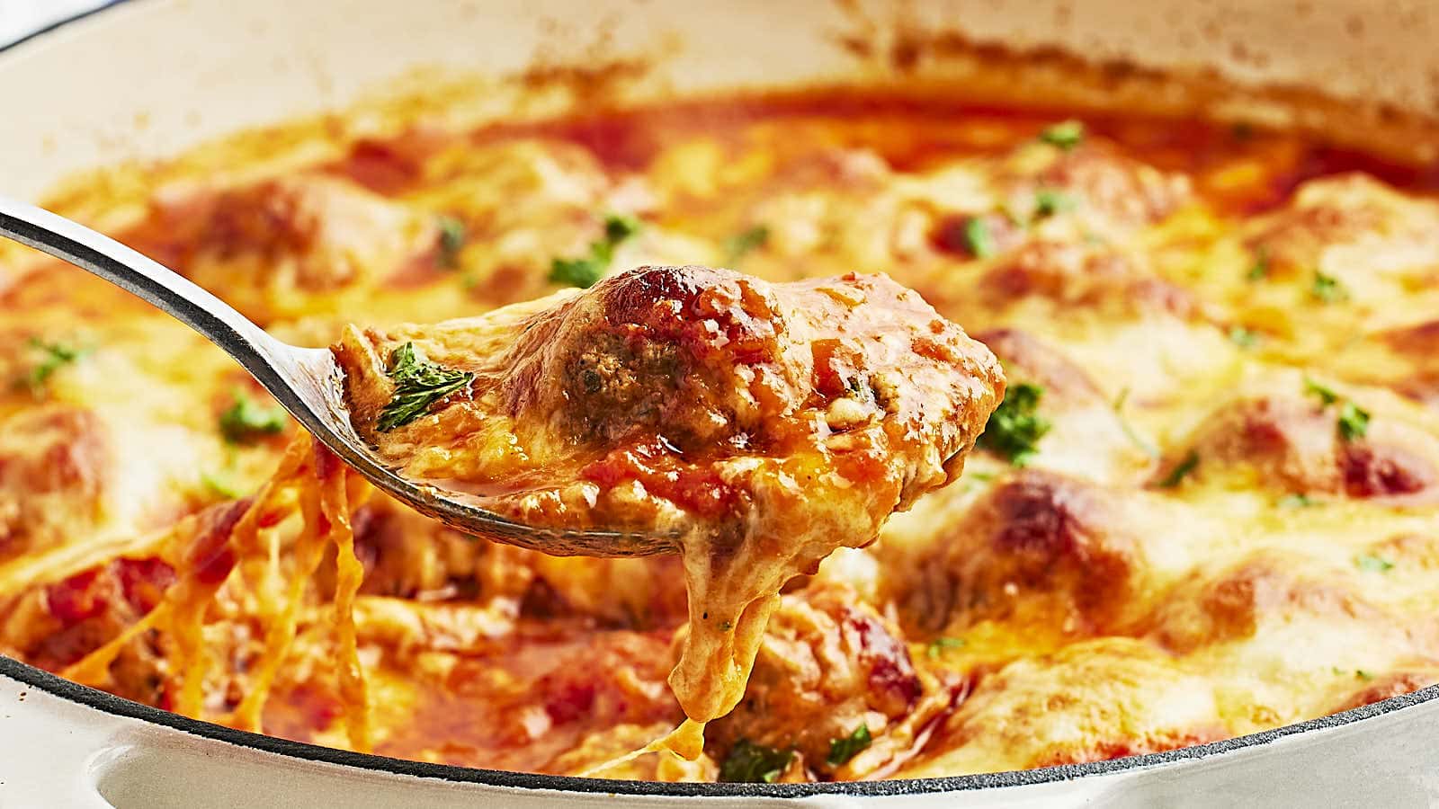 <p>This Cheesy Meatball Casserole is a hit at any dinner table, full of rich, hearty flavors that will make everyone come back for seconds. It's made with juicy meatballs, a savory marinara sauce, and topped off with a layer of gooey, melted cheese.</p><p><strong>Get the Recipe: <a href="https://cheerfulcook.com/cheesy-meatball-casserole/" rel="noreferrer noopener">Meatball Casserole</a></strong></p>