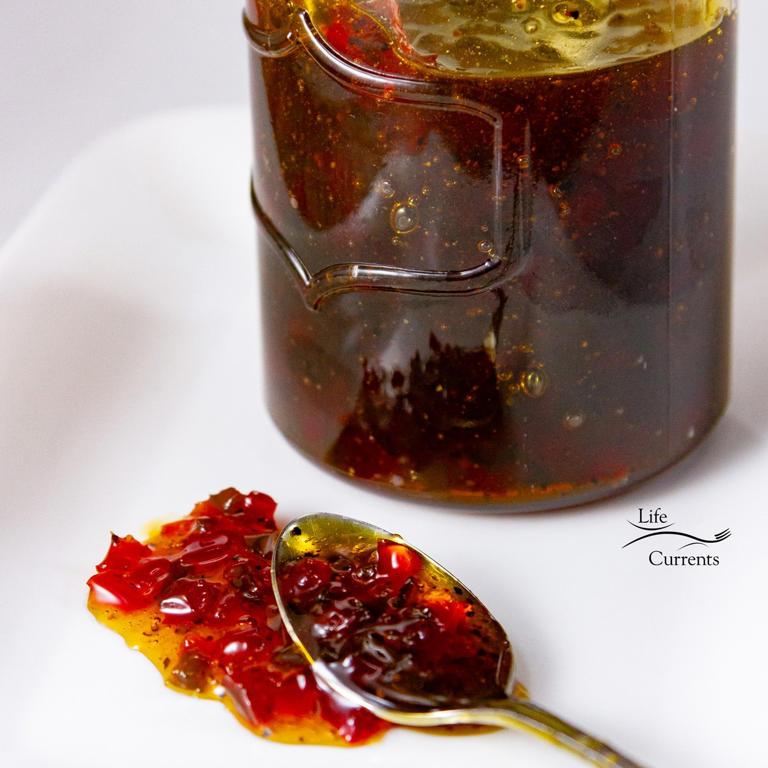 This homemade Pepper Jelly is sweet and spicy. It’s spreadable, and perfect on a cheese plate or charcuterie board. It might just become one of your favorite appetizers ever!
