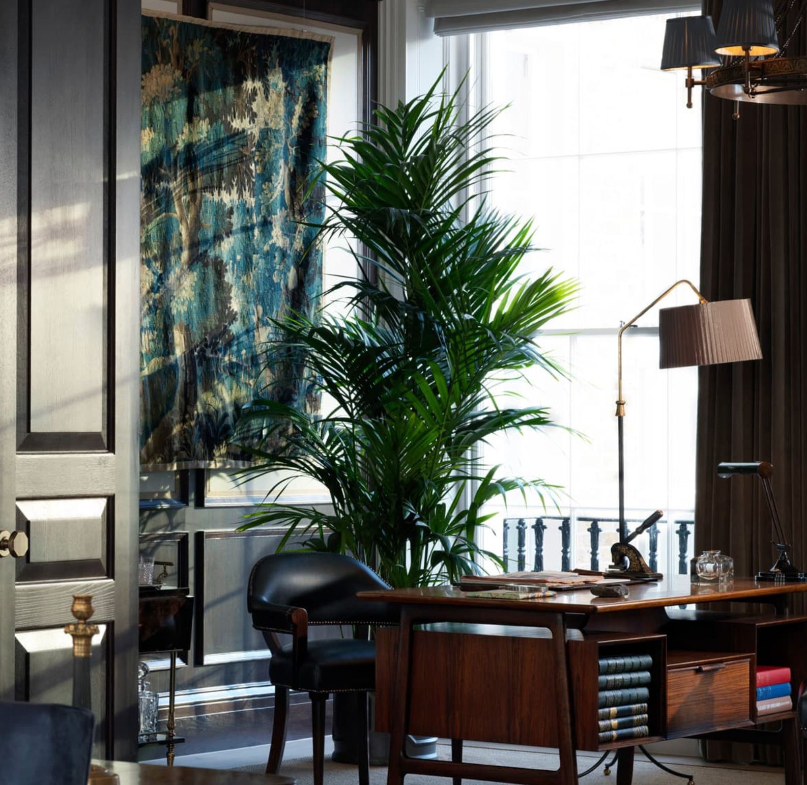 <p>                     If you don’t have the luxury of a great view – or even a window – in your home office, be inspired by Justina Blakeney of Jungalow and make one. If you can fit a selection of houseplants on the far side of the desk, so much the better, but if there’s not space for the real thing, hang or prop a large foliage print in your eye line as the designer has done for her own studio desk.                    </p>                                      <p>                     Can’t find the right image? Follow Justina’s lead and take your own photos of foliage and have them printed at super scale and framed for a window-style outlook from the desk.                   </p>                                      <p>                     The room above demonstrates the plant-first approach perfectly. It was designed by Albion Nord as part of a project in London.                   </p>