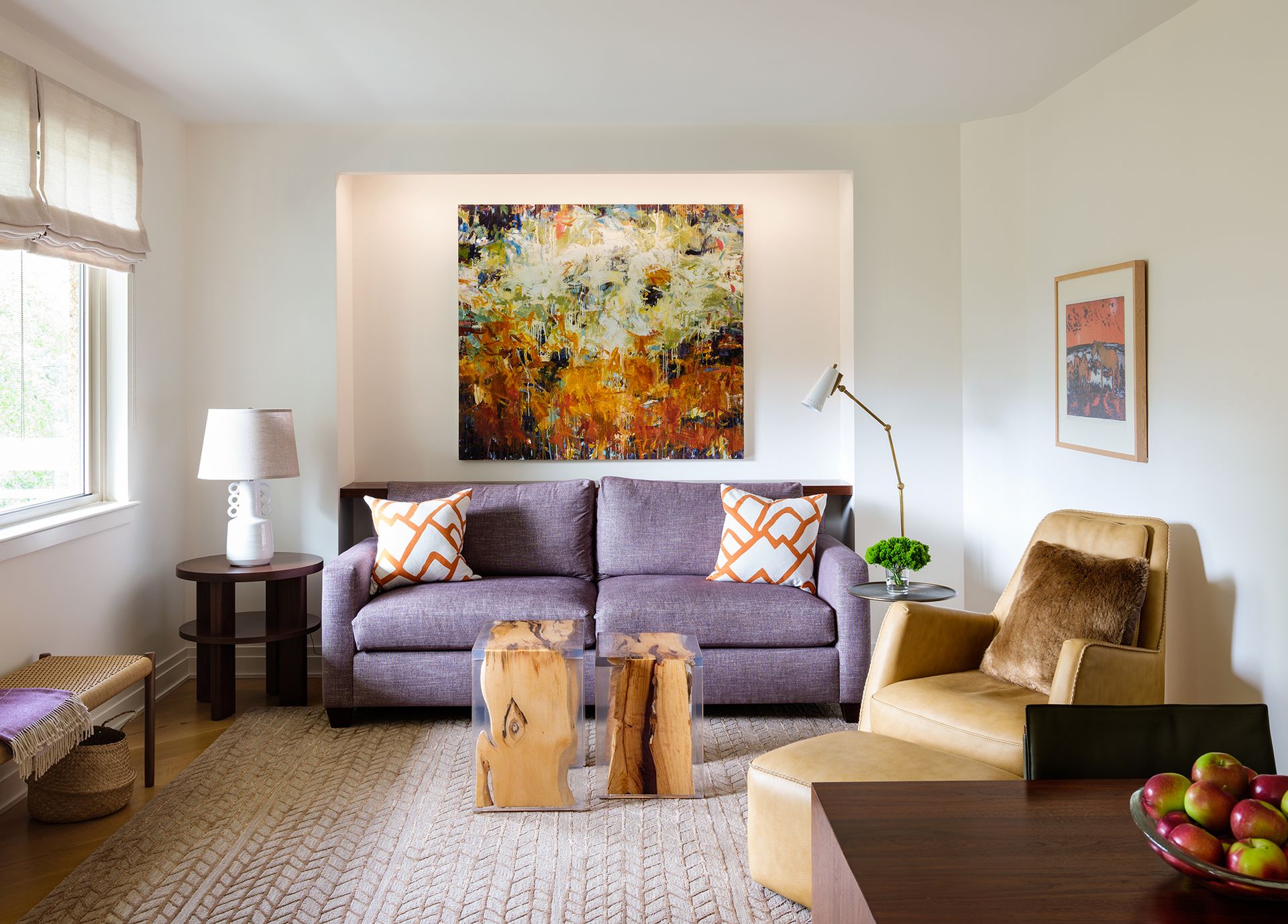 <p>                     Decorating with art will instantly elevate living room walls and is a brilliant way to create a focal point which will instantly draw your eye. When it comes to what type of art to choose think big says interior designer Annie Elliott.                   </p>                                      <p>                     'Most of us have artwork that's on the small side, but we need to think bigger! Pieces that are a minimum of 32 inches wide are always great to have,' says Annie Elliot. 'Over a fireplace, it's so much more appealing to hang a painting rather than a mirror or a TV. Over a sofa, one huge painting or a mixed media gallery wall can be show stopping.'                   </p>