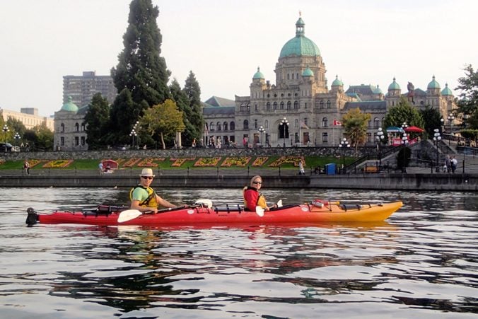 <p>You’ll get an entirely different perspective of Victoria from an urban kayaking tour. Outfitters such as <a href="https://kelpreef.com/" rel="noopener noreferrer">Kelp Reef Adventures</a> and <a href="https://oceanriver.com/adventure/victoria-urban-kayak-tour/" rel="noopener noreferrer">Ocean River Sports</a> guide kayakers of all ages through the historic harbour waterways, gliding underneath floatplanes and beside water taxis, tug boats, and some of the city’s most prominent landmarks. Guides are well-versed in aquatic life and will point you in the right direction to view seals, otters, brilliantly-hued starfish and even red rock crabs. For a mesmerizing view of Victoria's parliament buildings, opt for an evening tour, when the B.C. Legislature <em>(above) </em>twinkles like a Christmas display.</p>