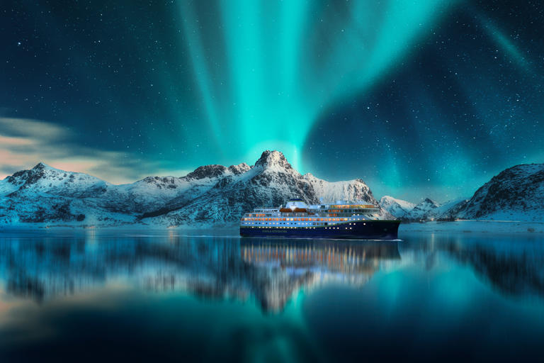 Havila Voyages ship under the Northern Lights. CREDIT: Denis Belitsky