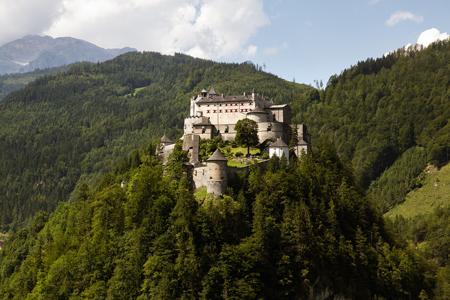 <h2>14. Burg Hohenwerfen (Hohenwerfen Castle)</h2> <p><i>Werfen, Austria</i></p> <p> A popular day trip from nearby <a class="Link" href="https://www.afar.com/travel-guides/austria/salzburg/guide" rel="noopener">Salzburg</a>, the 11th-century stone fortress of <a class="Link" href="https://www.salzburg-burgen.at/en/hohenwerfen-castle/" rel="noopener">Burg Hohenwerfen</a> ticks all the boxes when it comes to medieval grandeur. There’s the dramatic setting, 500 feet up on a rocky perch (a funicular will save you the climb) overlooking the Salzach Valley and surrounded by towering peaks of the Tennen mountain range. The castle, dating from 1077 (though it’s seen additions throughout the centuries), also looks the part, with multiple towers, magnificent wood-beamed state rooms, a grand frescoed knights’ hall, a hidden stone staircase, an arsenal, a dungeon, and even a torture chamber. Self-guided audio tours are available, and there’s one tailored to kids. The castle is also home to the State Falconry Center, with daily demonstrations of Indigenous birds of prey.<br> </p> <h3>How to visit Burg Hohenwerfen</h3> <p>The castle is open from April to November. There are direct trains from Salzburg to Werfen (lasting about 45 minutes); it’s a 20-minute walk to the castle’s funicular from the station. If you are driving from Salzburg, 25 miles away, there is an on-site parking lot, although note that it’s about a one-mile walk to the castle from there.</p> <p><i>This article was originally published in 2019 and most recently updated on October 16, 2023 with current information.</i></p>