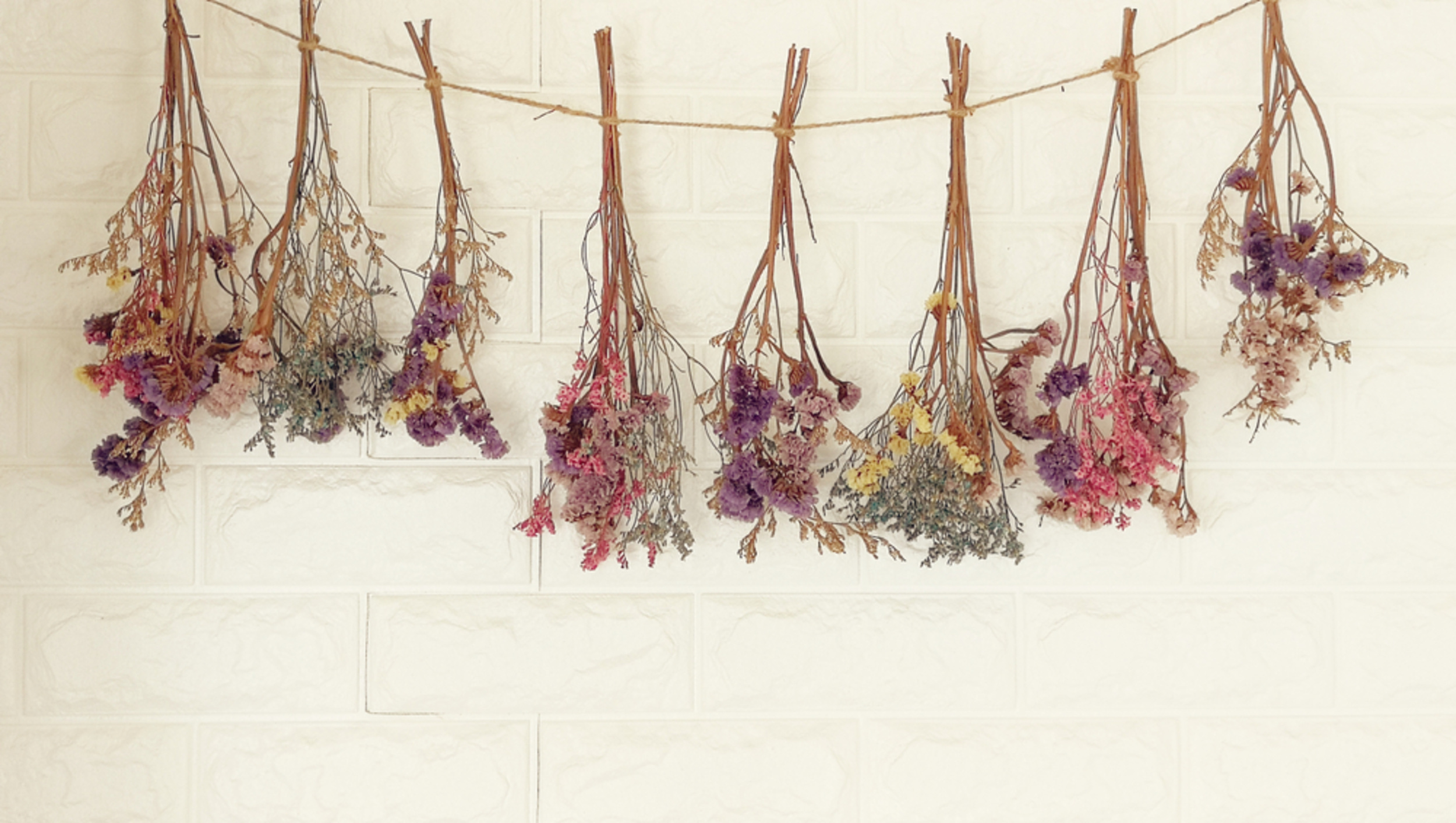 <p>Dried flowers are seriously trendy right now, and they couldn't be easier to make at home. Remove any leaves or foliage from the flowers' stems, then hang to dry in a cool, dark place for a few weeks until the flowers are completely dry. Then, arrange them in a vase for a decorative piece that lasts much longer than fresh flowers. </p><p>You may also like: <a href='https://www.yardbarker.com/lifestyle/articles/20_foods_you_didnt_know_you_can_make_on_the_grill_101823/s1__23860369'>20 foods you didn't know you can make on the grill</a></p>