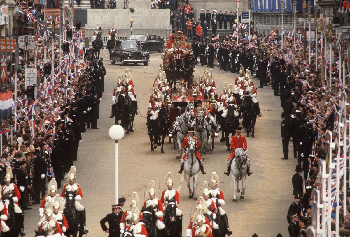 <p>The couple's processional ran from St. Paul's Cathedral to Buckingham Palace after the wedding. The newlyweds sat in an open air carriage and were escorted by the Household Cavalry.</p>