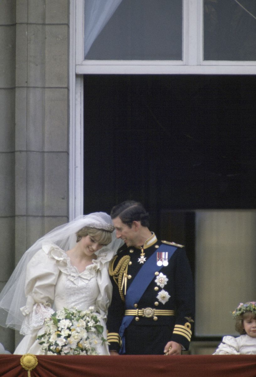 <p>Charles and Diana appear rather bashful on the balcony (where it's customary to share a kiss). TBH, a pretty normal reaction, considering the enormous crowds that were watching.</p>