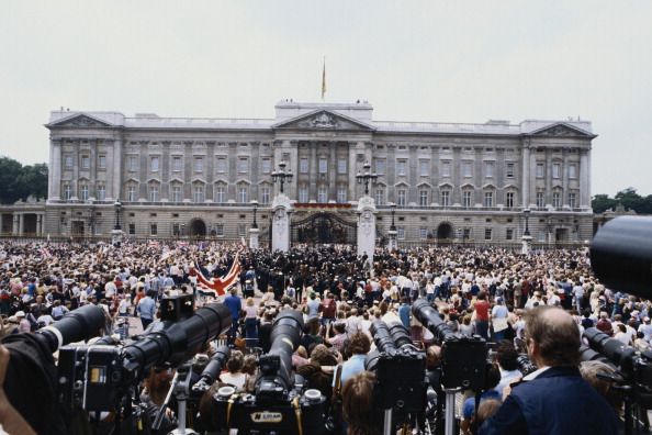 <p>Just imagine looking out at this sea of well-wishers on the day of your wedding. After everyone returned to Buckingham Palace for the reception, the crowd was allowed to move up to the gates.</p>