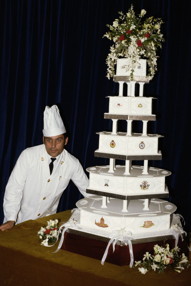 <p>When you have to feed thousands of guests at your reception, one cake will not do—so they had 27. But their official cake was a multi-tiered fruit cake made by the head baker at the Royal Naval Cookery School.</p>