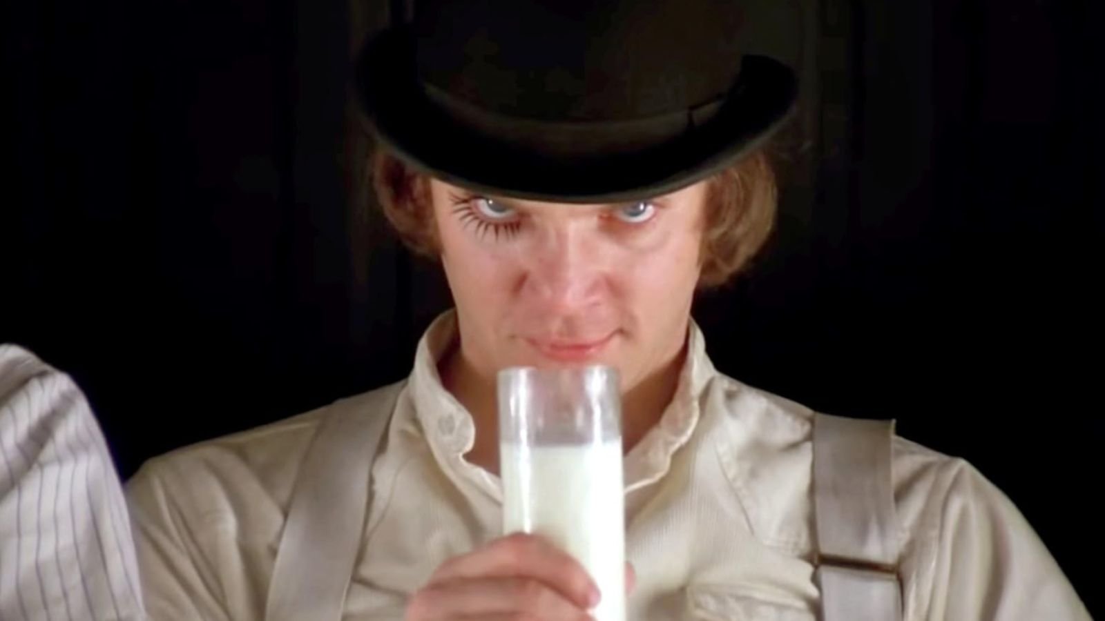 <p><span> Burgess’s unsettling vision of a future London, overrun by youth gangs and violent crime, made readers shudder. But Kubrick’s film adaptation? It was a real experience. The stark contrast of the droogs’ white outfits, the unnerving use of classical music during acts of violence, and Malcolm McDowell’s chilling portrayal of Alex kept viewers on edge long after the credits rolled.</span></p>