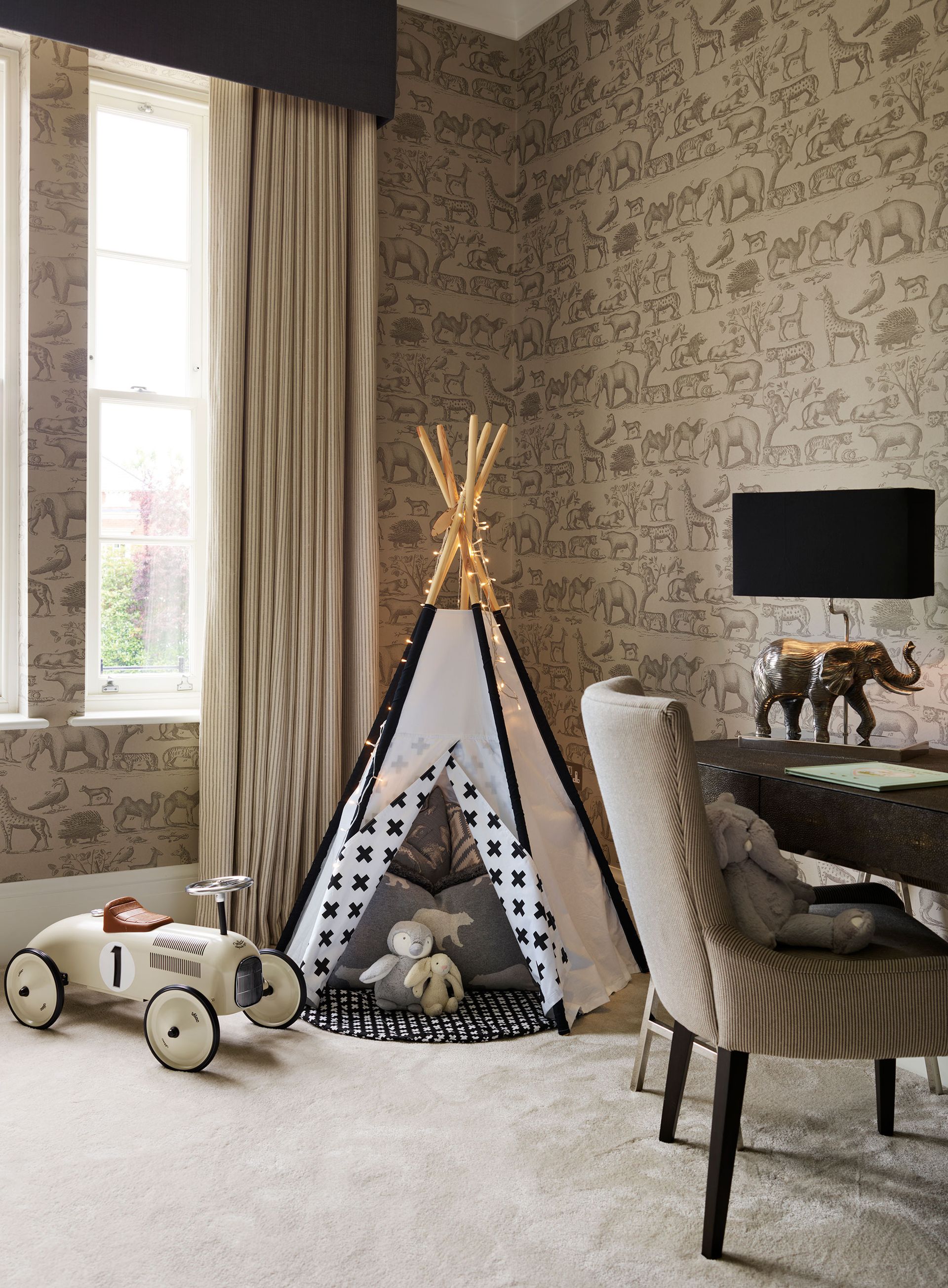<p>                     Children's wallpapers, matched with luxurious soft furnishings (all wipeable, of course), will give your playroom a luxe appeal that can match the rest of our home.                   </p>                                      <p>                     'Super soft carpet, beautiful drapes (and pelmet) teamed with a distinct illustrative safari wallpaper are all the ingredients for a luxury looking playroom. Add in a teepee with lights, a vintage car and lots of soft toys and your little one will be happy for hours,' says Andrea Childs, editor, <em>Country Homes & Interiors.</em>                   </p>