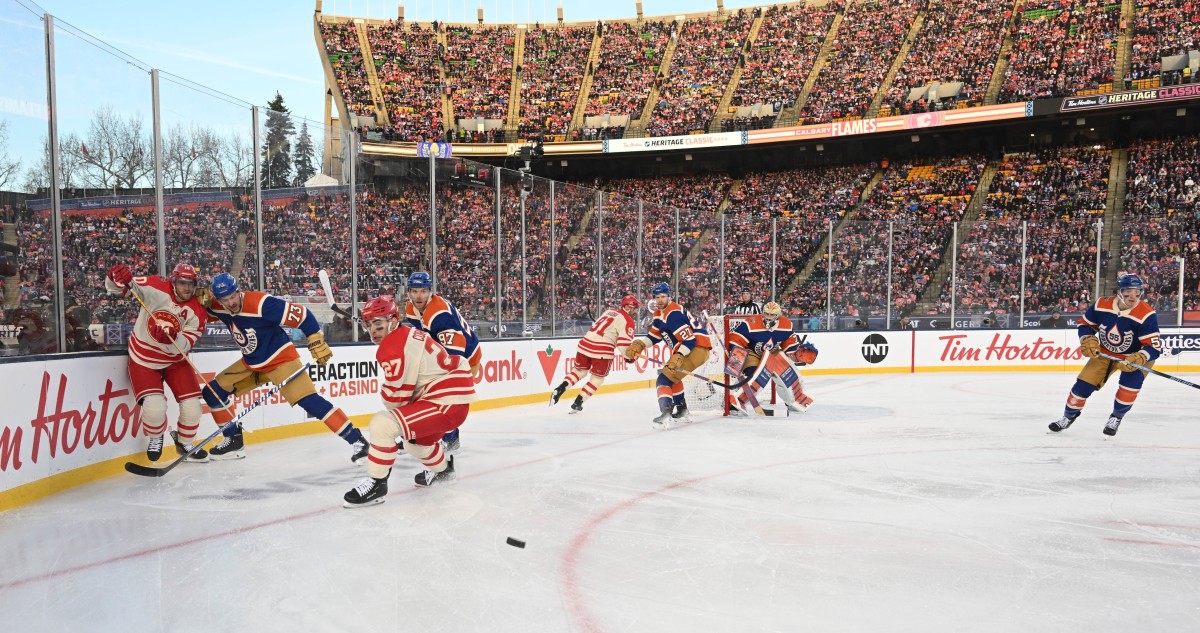 More than a reported 55,000 fans in attendance saw the Calgary Flames and Edmonton Oilers battle it out for the puck and the win on Sunday at Commonwealth Stadium in Edmonton. <a>Walter Tychnowicz-USA TODAY Sports</a>