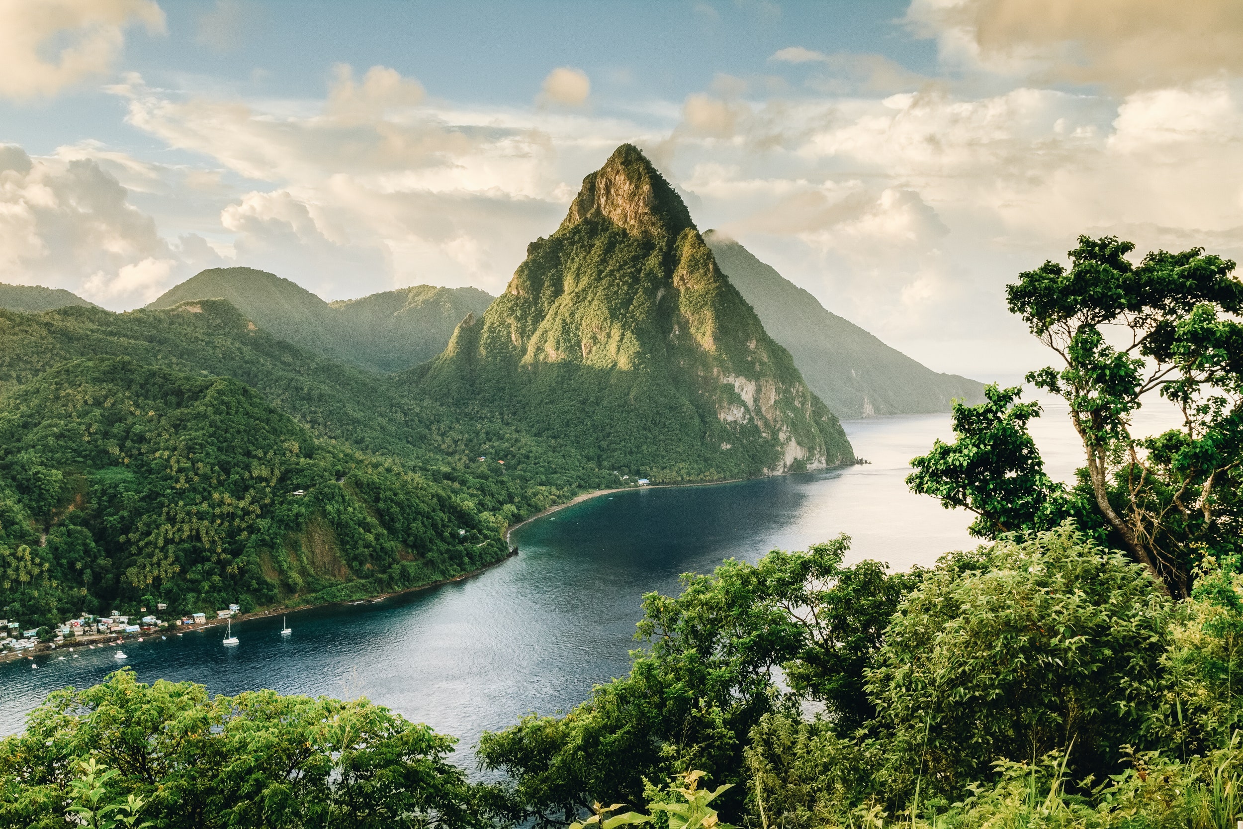 The scenery of St. Lucia can be summed up in one jaw-dropping site: a duo of striking spires known as the Pitons. The two volcanic peaks—Gros Piton and Petit Piton—are the most iconic landmarks on the island, and visitors can enjoy them in a variety of ways. A singular experience has to be actually hiking the mountains, an activity which takes the better part of a day. Or, if you prefer to keep your feet at sea level, plop a towel down at Sugar Beach, set dramatically (and conveniently) between the two Pitons.<p>Sign up to receive the latest news, expert tips, and inspiration on all things travel</p><a href="https://www.cntraveler.com/newsletter/the-daily?sourceCode=msnsend">Inspire Me</a>