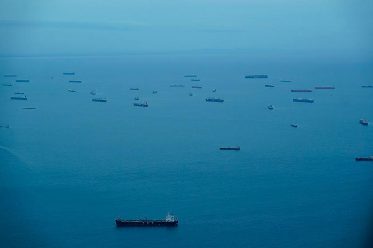 Cargo ships wait in Panama Bay for their transit through the Panama Canal in Panama City, on September 23, 2023 Arnulfo Franco / AP Photo