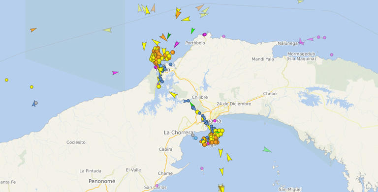A screenshot from ship-tracking website vesselfinder.com showing numerous ships clustered either side of the Panama Canal on a map, as of November 9, 2023. vessefinder.com