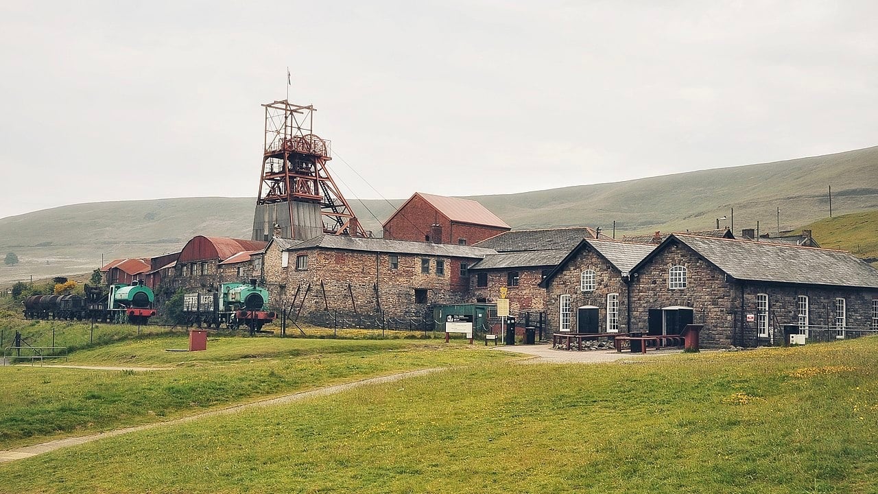 <p>The Blaenavon Industrial Landscape made it to the UNESCO World Heritage list in 2000, and the fascinating <a href="https://museum.wales/bigpit/" rel="nofollow noopener">Big Pit National Coal Museum</a> is integral to its educational purpose. The Big Pit functioned as a coal mine for a century between 1880 and 1980, and today, it shows visitors the intensity and relentlessness of life as a miner, from the shift to living conditions and beyond. The museum also puts Wales in an international context, showing how influential this little nation was in the early 20th century.</p>