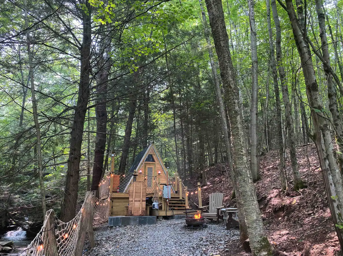 <p><strong>Bed & bath:</strong> 1 bedroom, 1 bath<br> <strong>Top amenities:</strong> Private hot tub, indoor fireplace, pets allowed</p> <p>This tiny, off-grid cabin is the ultimate glamping experience. It’s made for the couple whose idea of romance is snuggling under blankets by the fire after a day of hiking. With a firepit, mineral spring hot tub, glowing string lights, and Adirondack chairs out front, the outdoor space is luxe and cozy during the fall and winter. The off-grid tiny house has a top-notch, queen-size Japanese tatami bed, a wood heater, and a propane grill, but no bathroom or kitchen. It’s also one of two properties on a 12-acre lot.</p> $130, Airbnb (starting price). <a href="https://www.airbnb.com/rooms/831904623617858532">Get it now!</a><p>Sign up to receive the latest news, expert tips, and inspiration on all things travel</p><a href="https://www.cntraveler.com/newsletter/the-daily?sourceCode=msnsend">Inspire Me</a>