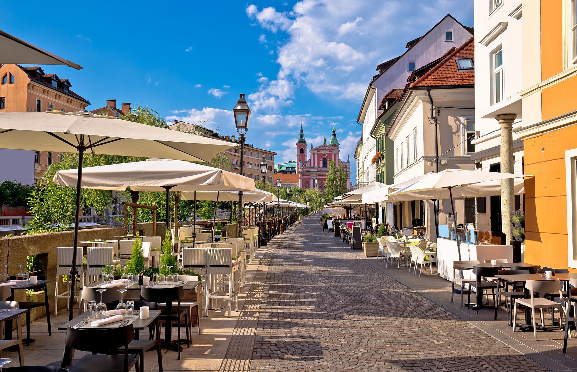 <p>Slovenia’s capital is one of the most visually appealing in Europe; a harmonious blend of Baroque and Art Nouveau architecture – not to mention an attractive string of cafes and bars along the Ljubljanica River. Some of the bars suit certain times of the day: for example, the ones along Petkovskovo nabrezje are the buzziest at happy hour. On hot summer days, head south to the large grassy area of Spica.</p>  <p><strong><a href="https://www.loveexploring.com/galleries/64460/12-reasons-to-love-slovenia">Here are even more reasons to love Slovenia</a></strong></p>