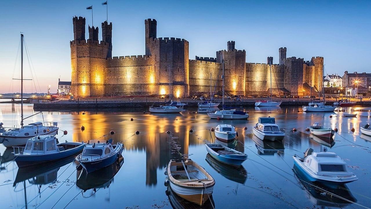 <p>Wales is famous for its medieval fortresses and castles, but don’t expect these grand structures to be universally loved nationwide. The Welsh have a complex relationship with the castles, primarily because they were built as a symbol of oppression and occupation, dating to the Edwardian Conquest of Wales in the 13th century. Caernarfon is the most prominent symbol of that, an undeniably stunning castle packed with symbolism and deeper meaning.</p>