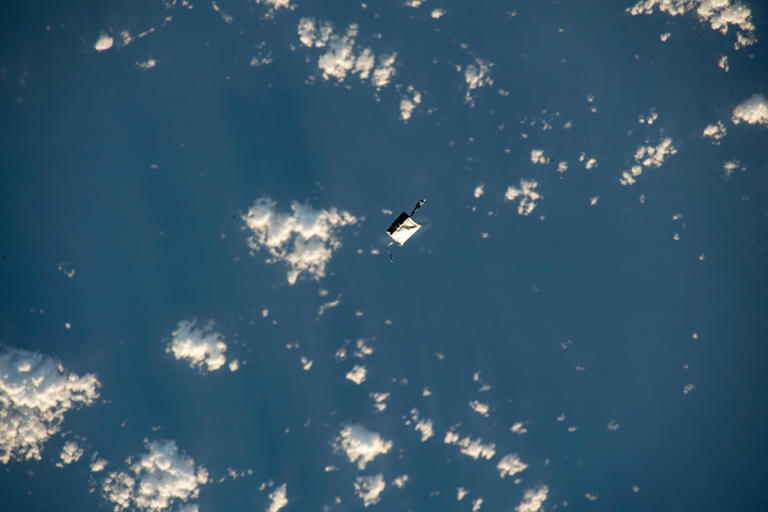 A photo captured by Japan Aerospace Exploration Agency astronaut Satoshi Furukawa shows a tool bag floating more than 200 miles above the Pacific Ocean. The bag slipped away from two astronauts performing maintenance on the International Space Station. Nov. 2, 2023.