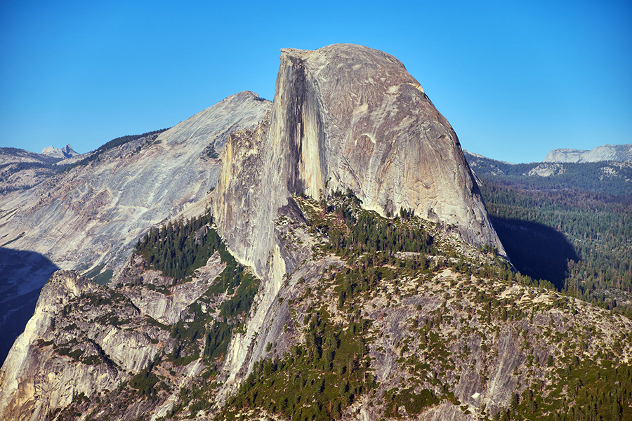 <h4>California</h4>  <p>This ascent is over 5,000 feet, much of which is nearly vertical. While it may sound like a rock climber’s dream, the Half Dome has taken about 60 lives in recent history. It is estimated that those who do make it to the top burn between 4,000 and 10,000 calories in doing so.</p> <p>While the Half Dome is a great workout, it's one of the most dangerous features of Yosemite National Park. In fact, back in the 1870s, the California Geological Survey deemed the structure "perfectly inaccessible" until one traveler George G. Anderson reached the summit by using drills and iron eyebolts to climb. </p>