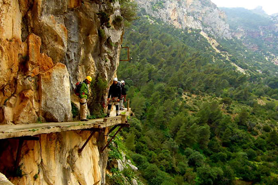 <h4>Spain</h4>  <p>Caminito Del Rey is a man-made walkway along the side of a mountain that claimed the lives of enough people to have it closed off from the public, but that didn't stop people from trespassing onto its deadly path. In 2015, the path reopened after many years of renovations made to restore the deteriorated concrete and exposed rusted metal supports.</p>    <p>Also known as "The King's Little Path," it's difficult to imagine people actually using this walkway for travel. The forest can't possibly be as bad as traveling on a wooden path 330 feet over the river below. After five people died from 1999 to 2000, the route was dubbed the "world's most dangerous walkway."</p>