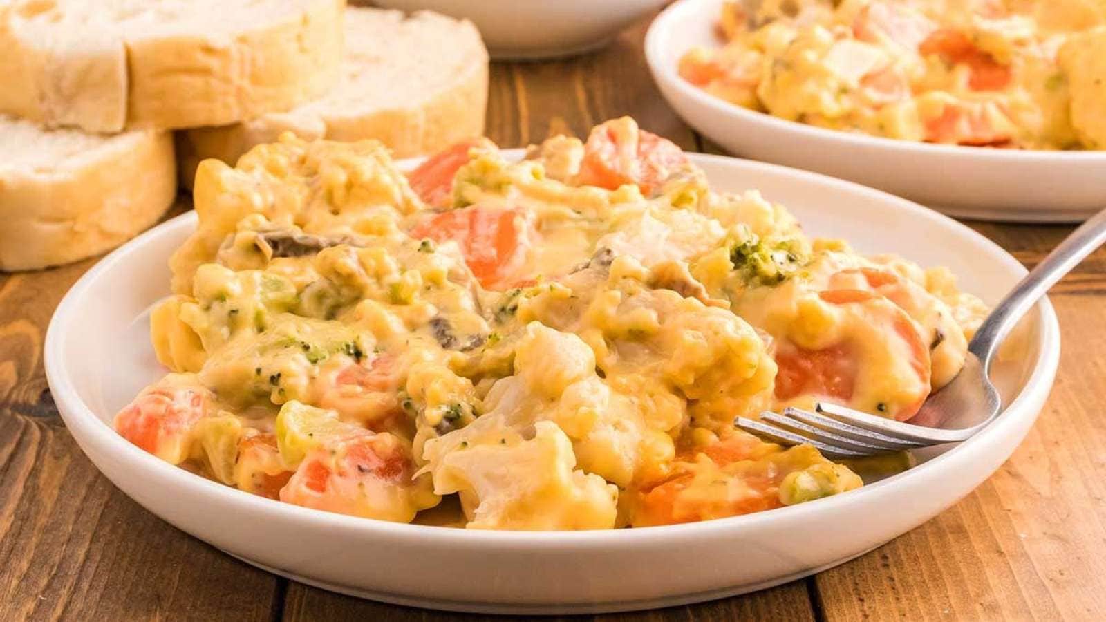 <p>This cheesy vegetable bake is a delicious vegetable medley that takes mere minutes to throw together. It’s a foolproof dish prepared with frozen mixed vegetables, cream of mushroom soup, butter, cheese, and crispy bread crumbs. </p><p><strong>Get the Recipe: <a href="https://xoxobella.com/cheesy-vegetable-casserole/" rel="noreferrer noopener">Cheesy Vegetable Casserole</a></strong></p>