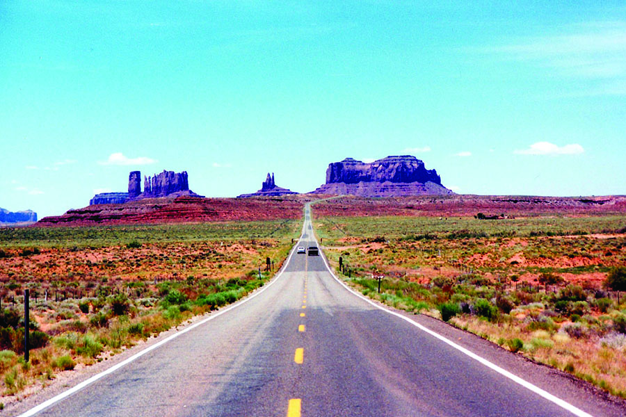 <h4>Monument Valley, Arizona</h4>  <p>The majestic stone buttes jutting out of the flat Western landscape are a symbol of the American West. Highway 163 runs through 64 miles of this gorgeous terrain in Navajo Nation. <a href="https://www.google.com/url?sa=t&rct=j&q=&esrc=s&source=web&cd=1&cad=rja&uact=8&ved=0ahUKEwjHpazflbfNAhUHA1IKHezpCncQFggdMAA&url=http%3A%2F%2Fwww.gouldings.com%2Fcampground%2F&usg=AFQjCNHuNJTHxP7sJcFQTAtwKVT_kaM9ww&sig2=Y1ZYD9zZ9SnOaoUpZfAYMA&bvm=bv.124817099,d.aXo">Goulding's Campground</a> is on the Utah side if you want to camp nearby.</p>  <p>(Image via <a href="https://www.flickr.com/photos/thintruman/16904397125/">Flickr</a>)</p>
