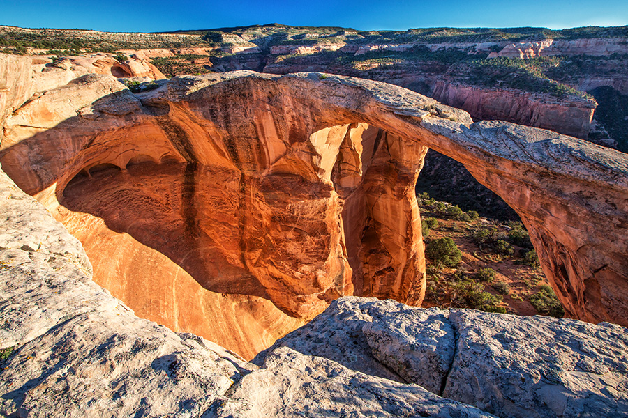 <p>This 512-mile loop runs through Colorado and Utah and encompasses an incredible array of prehistoric wonders. These wonders include the Dinosaur National Monument (an area with over 800 paleontological sites), the Natural Bridges, Arches National Park, Canyonlands, and the Flaming Gorge. There's obviously plenty to see and do here!</p>  <p>(image via <a href="https://www.flickr.com/photos/mypubliclands/28537119781/in/photolist-DUpFc-4EKkgi-4EKesX-4hxWvc-DRCbj-4hC2ph-4hC3au-4hxX9g-4hxX4R-4hxWKe-4CrgEa-4hC29A-2yoF6S-76mcz-4hC26Y-3XAfdq-4hC3ZA-4CuhpA-4hAgti-3XAfto-4CukJG-4hxXnT-4hC2U1-4hxWU4-76mcV-4CrhbM-2yjm7e-JEem1z-KtJcuz-KxNCBG-4CrdJ2-4hxWMZ-4Cumz3-3XAg7N-4Cq5GK-4hxWX6-4hxXpR-4Cq1up-4CuksQ-4Cq5rp-4CrdYi-4Crh26-4Cq3X4-4Cvve9-4Cvxjf-4CukcS-4hxWZM-4Cq4up-4hEkJ3-4hEkBu">Flickr</a>)</p>