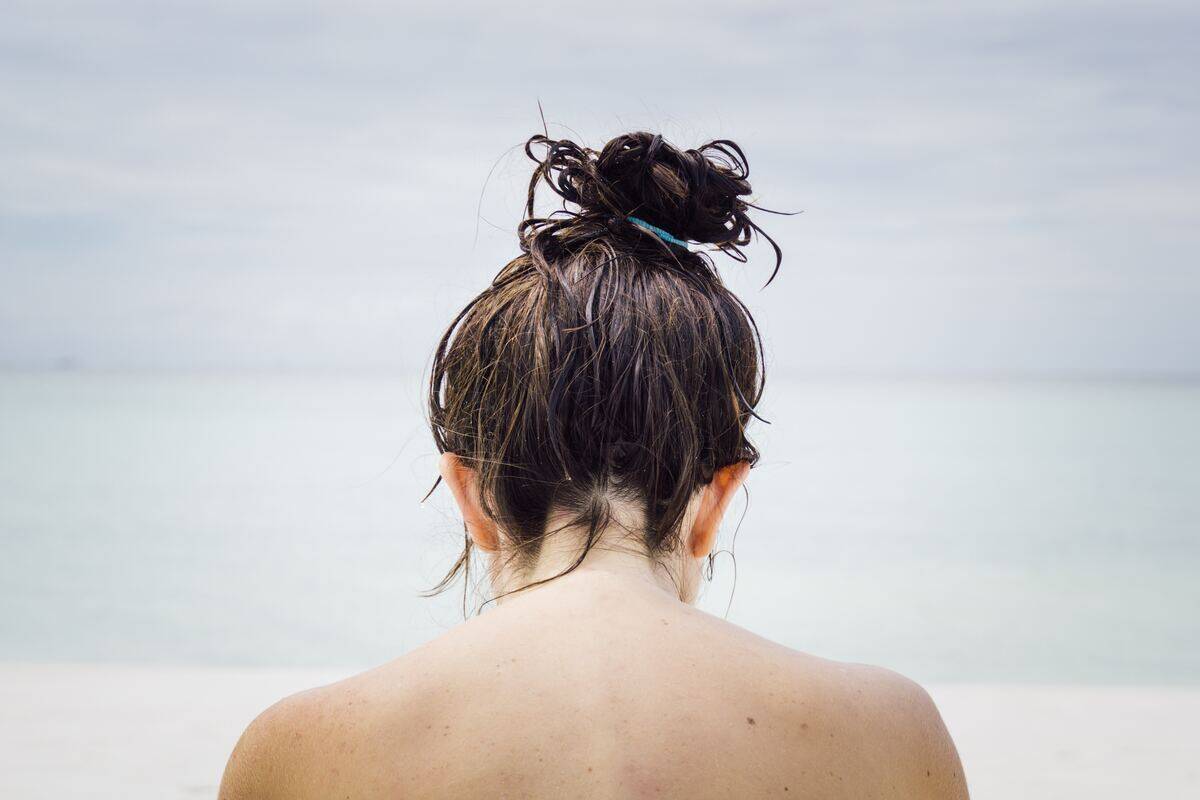 <p>It is important not to tie your hair when wet, as wet hair is more susceptible to damage and breakage, especially when tied back tightly. Tying wet hair can cause tension breakage, as wet hair stretches up to a third of its length when tied back tightly. </p> <p>This tension can lead to hair breakage and damage, ultimately affecting the overall health and appearance of the hair. Also, sleeping with damp tresses in tight styles, such as braids and buns, can put tension on the hair, making it more vulnerable to breakage.</p>