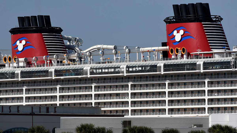 PORT CANAVERAL, UNITED STATES – 2020/03/13: The Disney Dream cruise ship prepares to depart from Port Canaveral in Florida the day before the cruise line suspends its operations for all new departures effective March 14 in response to the coronavirus (COVID-19) outbreak. (Photo by Paul Hennessy/SOPA Images/LightRocket via Getty Images)