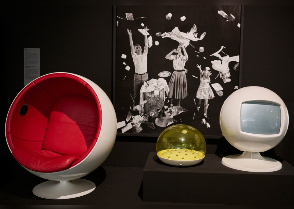 <p>Despite not setting out to create a futuristic design, Eero Aarnio's Ball chair has gone down in history as one of the most iconic Space Age designs and arguably one of the most iconic industrial design pieces, period.</p>  <p>Ball chairs, made of fiberglass, immediately call to mind futuristic pods, with precise geometry, synthetic materials, and eye-popping colors that evoked a man-made future when it was released to the public in 1966. The design was also popular onscreen, appearing in well-known science fiction films such as "Mars Attacks."</p>  <p>Also pictured is Italian designer Gino Sarfatti's Moon lamp, made with a translucent plastic dome with several microbulbs inside that echo lunar craters. Sarfatti designed the product in 1969, which also happens to be the year humankind first landed on the moon.</p>
