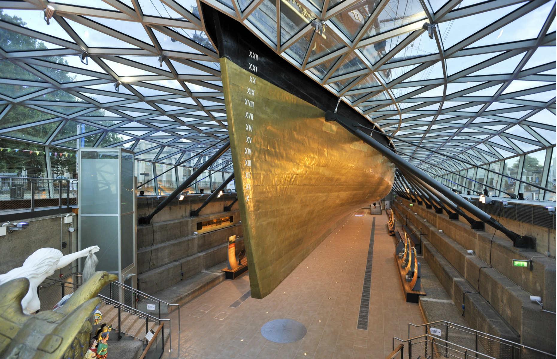 <p>You can walk beneath the hull, see the captain’s table and take the ship’s wheel – and from April 2022 you can even <a href="https://www.rmg.co.uk/cutty-sark/attractions/cutty-sark-rig-climb-experience">climb the rigging</a> (with pre booked tickets). Greenwich has a wealth of museums worth taking in, such as the Maritime Museum, Royal Observatory, the Queen’s House and Painted Hall, all part of the Naval College. The most appropriate way to get there is down the Thames on the Clipper ferry service.</p>