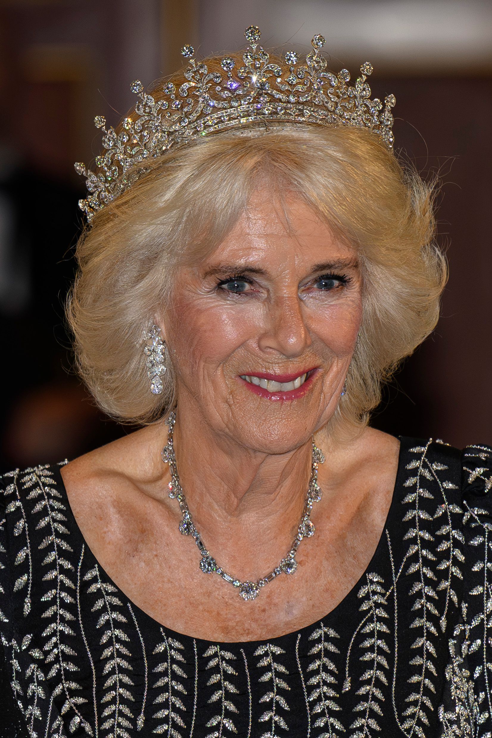 <p><span>On Oct. 18, 2023, Queen Camilla made her debut in the Girls of Great Britain and Ireland tiara, an iconic headpiece that was originally gifted to Queen Mary as a wedding present in 1893. Queen Mary, in turn, gifted the piece to Queen Elizabeth II as a wedding present when she married Prince Philip in 1947. (Elizabeth reportedly referred to the crown as "Granny's tiara.")</span></p><p>Camilla also donned diamond drop-earrings, plus a diamond necklace and matching bracelet that her late mother-in-law received as 21st birthday presents from the then-prime minister of South Africa.</p><p>She chose the special pieces for a ceremonial dinner at Mansion House that she attended with King Charles III to mark their first official visit to the City of London following their coronation. </p>
