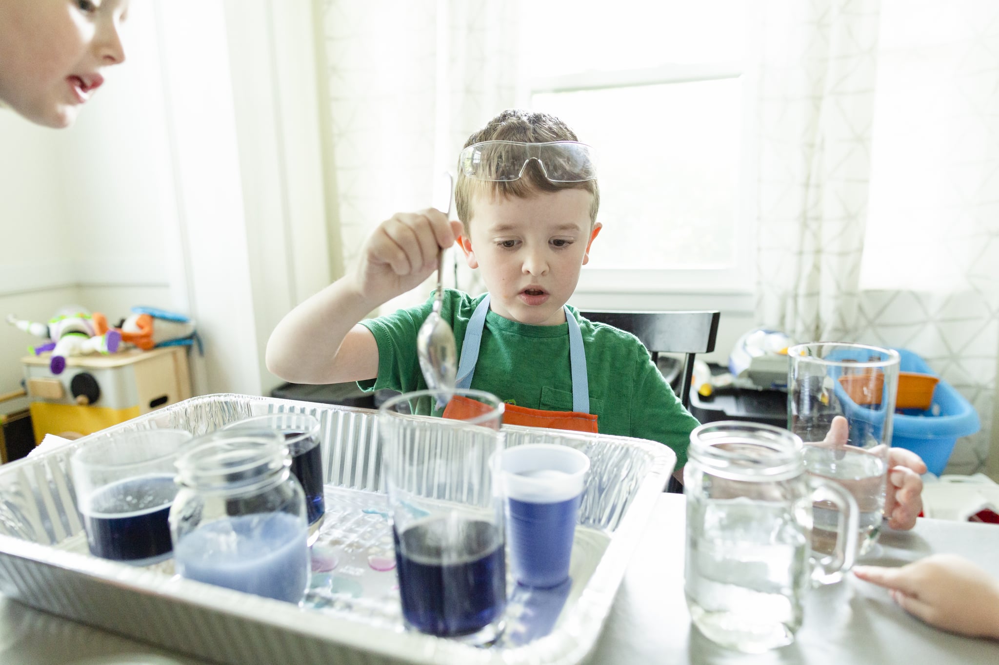 <p>Beat boredom blues by engaging a child's love of discovery. Younger kids around two or three will love helping to mix dyes or into foods to create new colors (think: turning milk blue or combining red and yellow to make orange). </p>